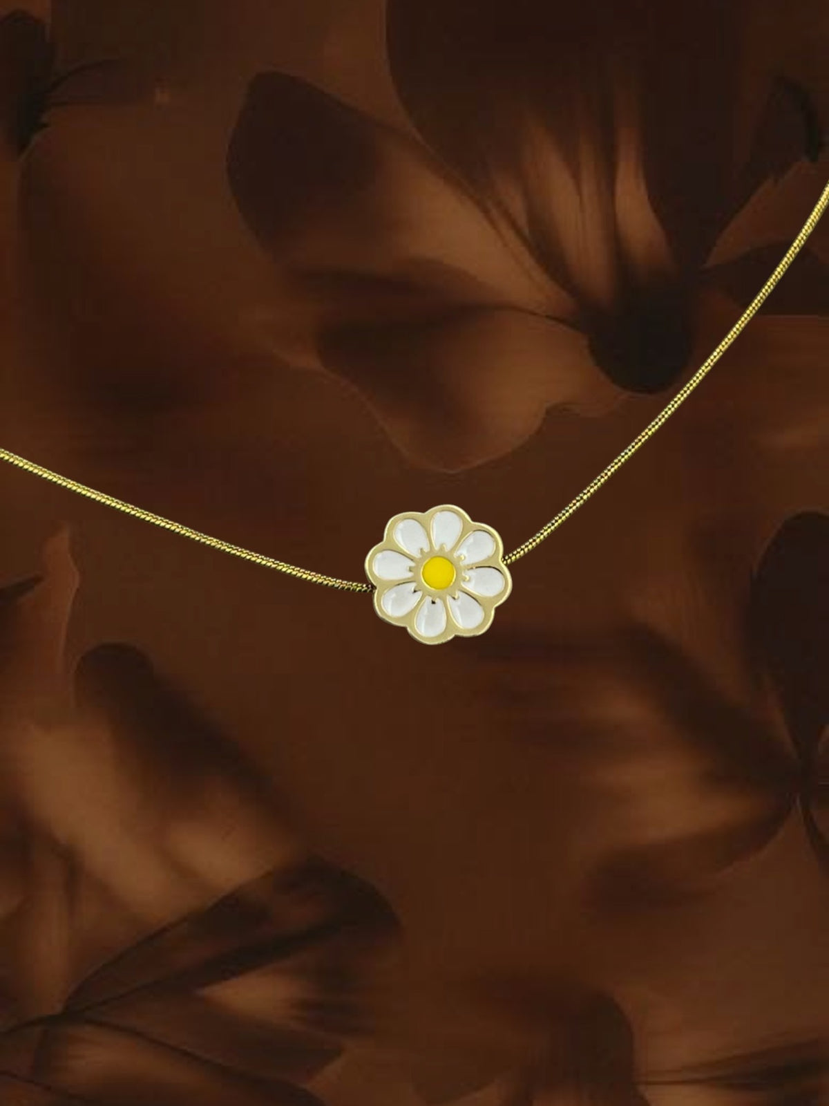 SHE BEAUTY gold-tone chain necklace featuring a white and yellow enamel flower pendant for festive or daily wear.
