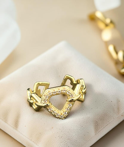 SHE BEAUTY gold-toned anti-tarnish ring featuring a geometric heart-shaped center with sparkling AD stone accents.