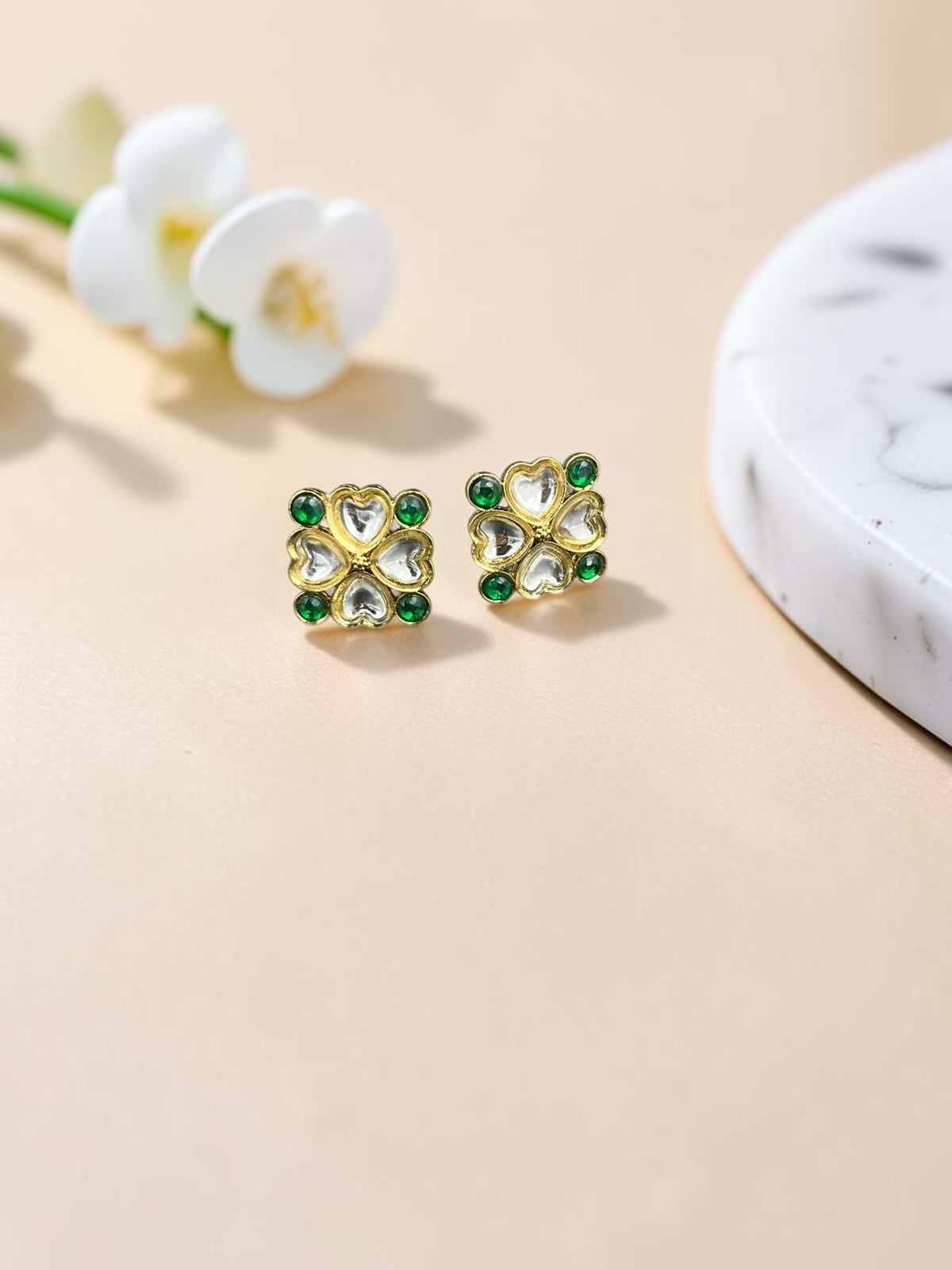 SHE BEAUTY gold-toned square kundan tops featuring heart-shaped clear stones and small green accents for ethnic wear.