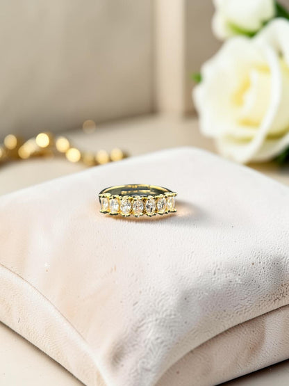SHE BEAUTY gold-toned anti-tarnish ring featuring a row of sparkling marquise-cut American Diamond stones.