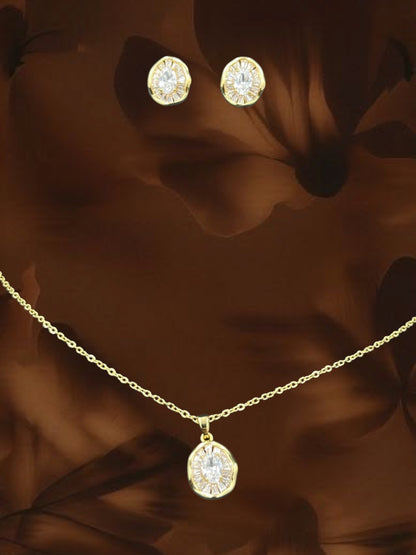 SHE BEAUTY gold-toned medallion pendant necklace and matching stud earrings with sparkling baguette-cut crystals.
