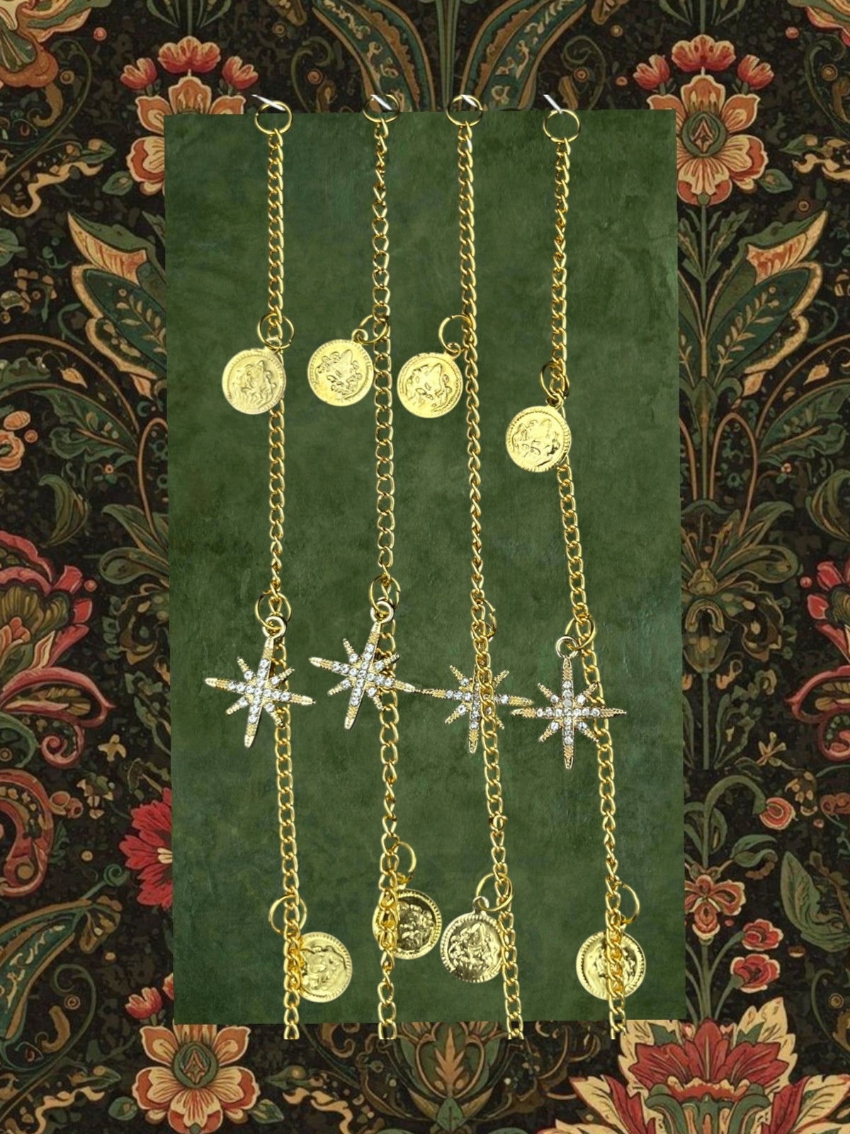 SHE BEAUTY gold-toned chain trails featuring sparkling star charms and coin pendants for festive party wear.