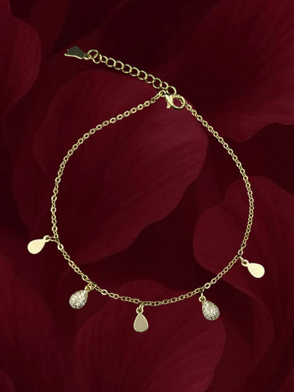 SHE BEAUTY anti-tarnish gold-tone anklet for girls featuring delicate teardrop charms and sparkling crystal accents.