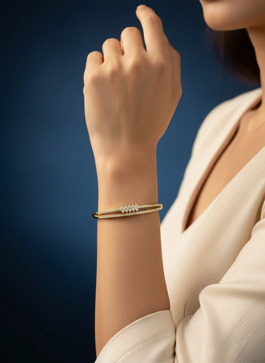 SHE BEAUTY anti-tarnish gold bracelet featuring a delicate double-band design with sparkling zirconia stones