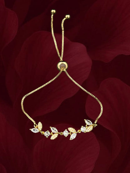 SHE BEAUTY gold-toned zirconia leaf bracelet with adjustable chain, perfect for festive and party wear.