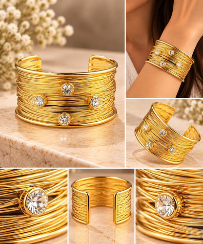 SHE BEAUTY golden multilayer cuff bracelet featuring sparkling AD stones, perfect for festive and party wear.