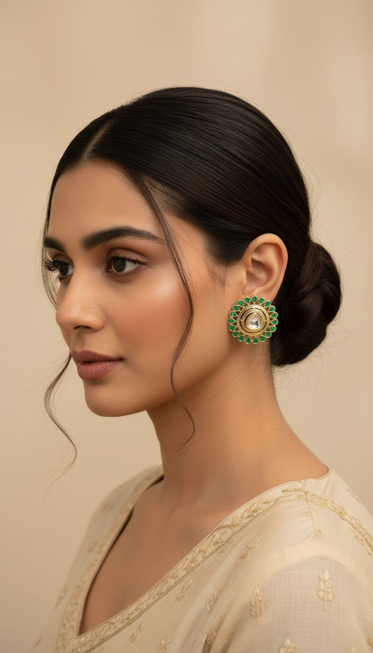SHE BEAUTY round kundan tops with green stone accents worn by a model in a traditional Indian style