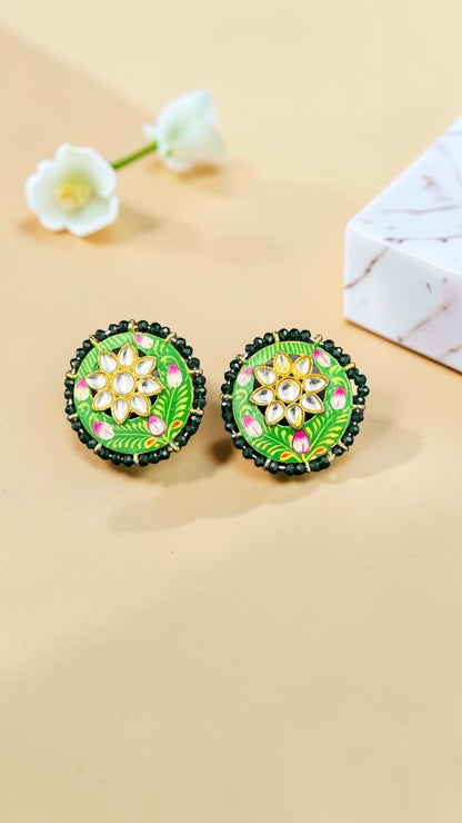 SHE BEAUTY Jaipuri Meena tops featuring green enamel floral patterns, central kundan stones, and black beaded borders.
