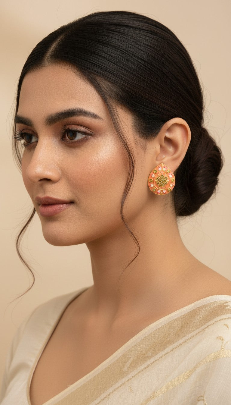 SHE BEAUTY Jaipuri tops featuring a peach teardrop stud earring with intricate gold floral and stone detailing