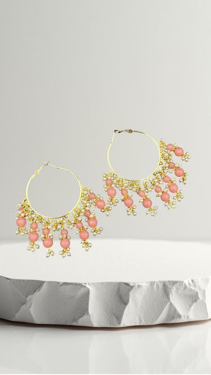 SHE BEAUTY Kashmiri Bali gold hoop earrings featuring pink beads and delicate white pearl accents