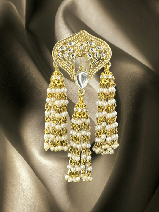 SHE BEAUTY Kashmiri floral Kundan hair brooch with gold-tone metal, white pearl tassels, and teardrop stone accents.