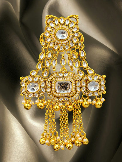 SHE BEAUTY Kashmiri AD Kundan Juda hair brooch in gold tone with sparkling stones, pearl accents, and hanging ghungroos.