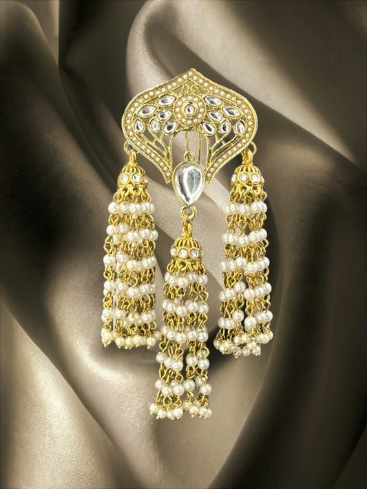 SHE BEAUTY Kashmiri floral kundan hair brooch with gold-tone metal, white pearl tassels, and intricate stone detailing.