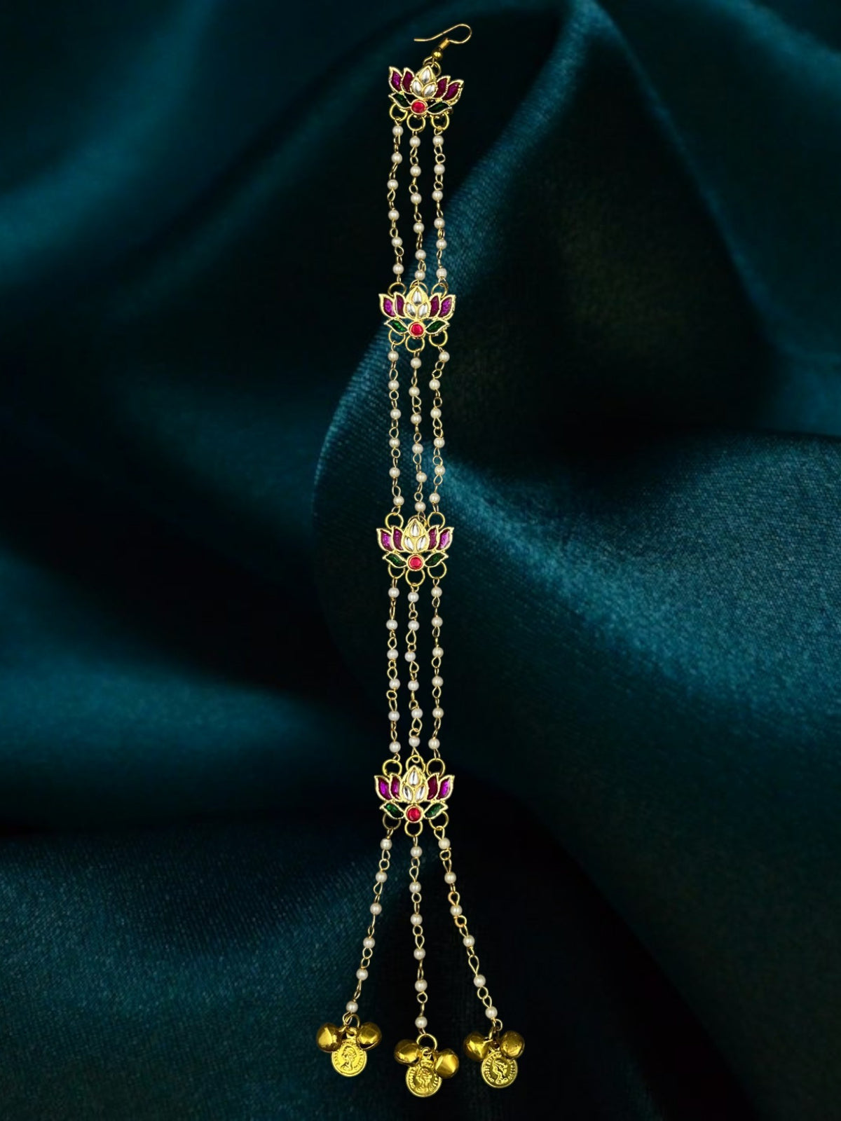 SHE BEAUTY Kashmiri lotus meenakari braid accessory with pearl chains, pink and green enamel, and gold coin charms.