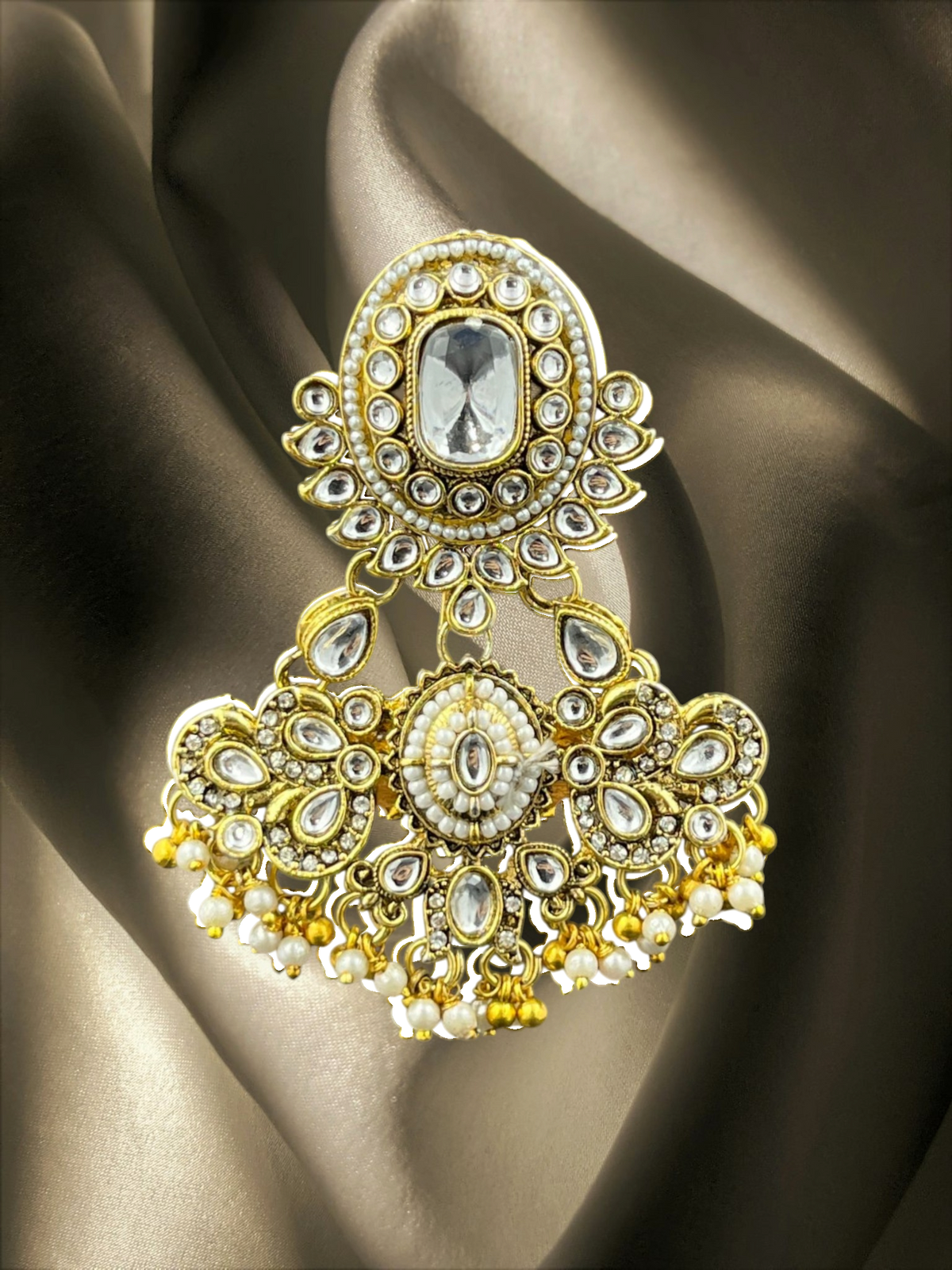 SHE BEAUTY Kashmiri Polki Kundan juda hair brooch with white stones, pearls, and gold-tone metal for festive wear.