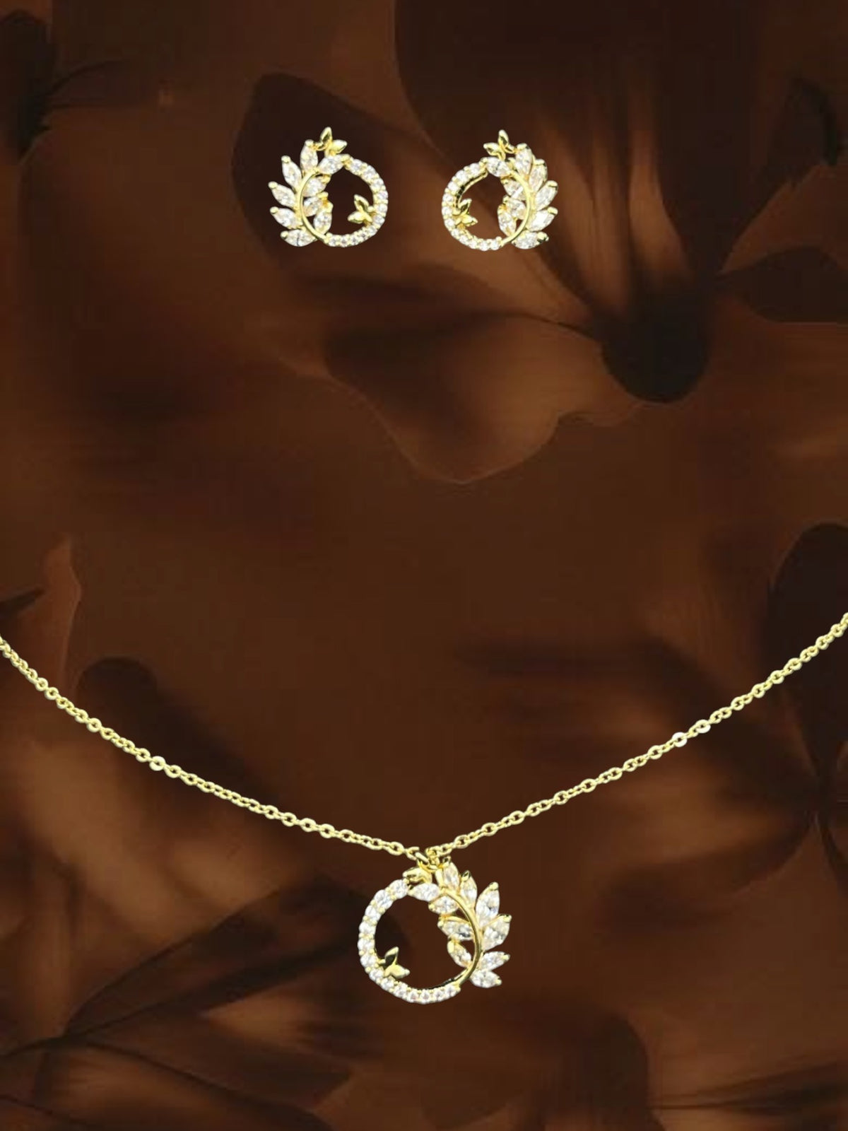 SHE BEAUTY Korean halo pendant set featuring gold-tone leaf-inspired necklace and matching stud earrings with crystals