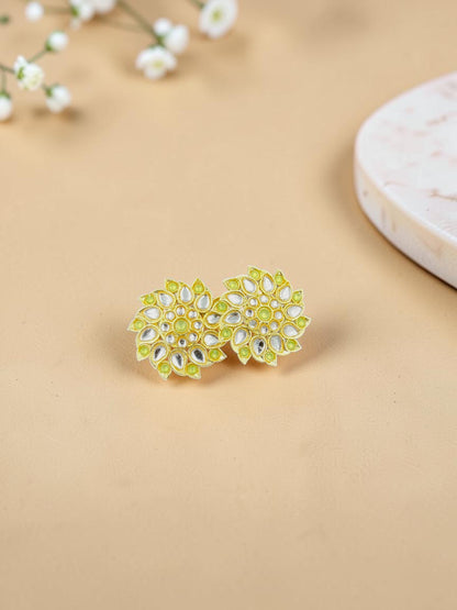 SHE BEAUTY Royal Kundan gold stud earrings featuring a floral design with lime green accents and clear stone detailing.