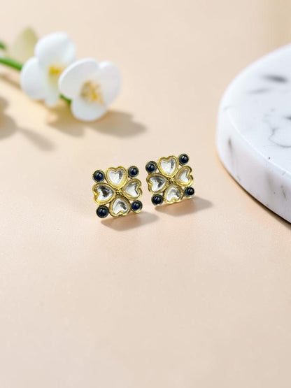 SHE BEAUTY gold-toned kundan tops featuring a floral heart design with dark blue accents for ethnic and modern wear.