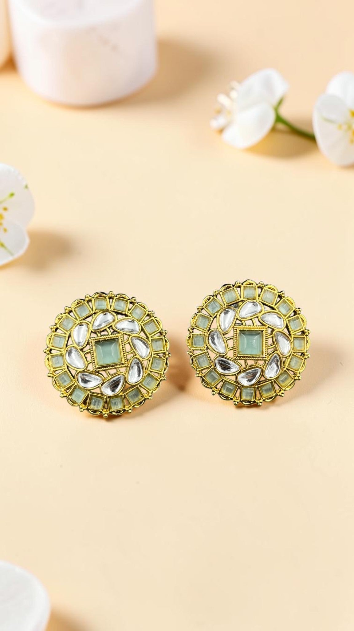 SHE BEAUTY premium kundan tops featuring round gold-toned frames with mint green and clear stone accents