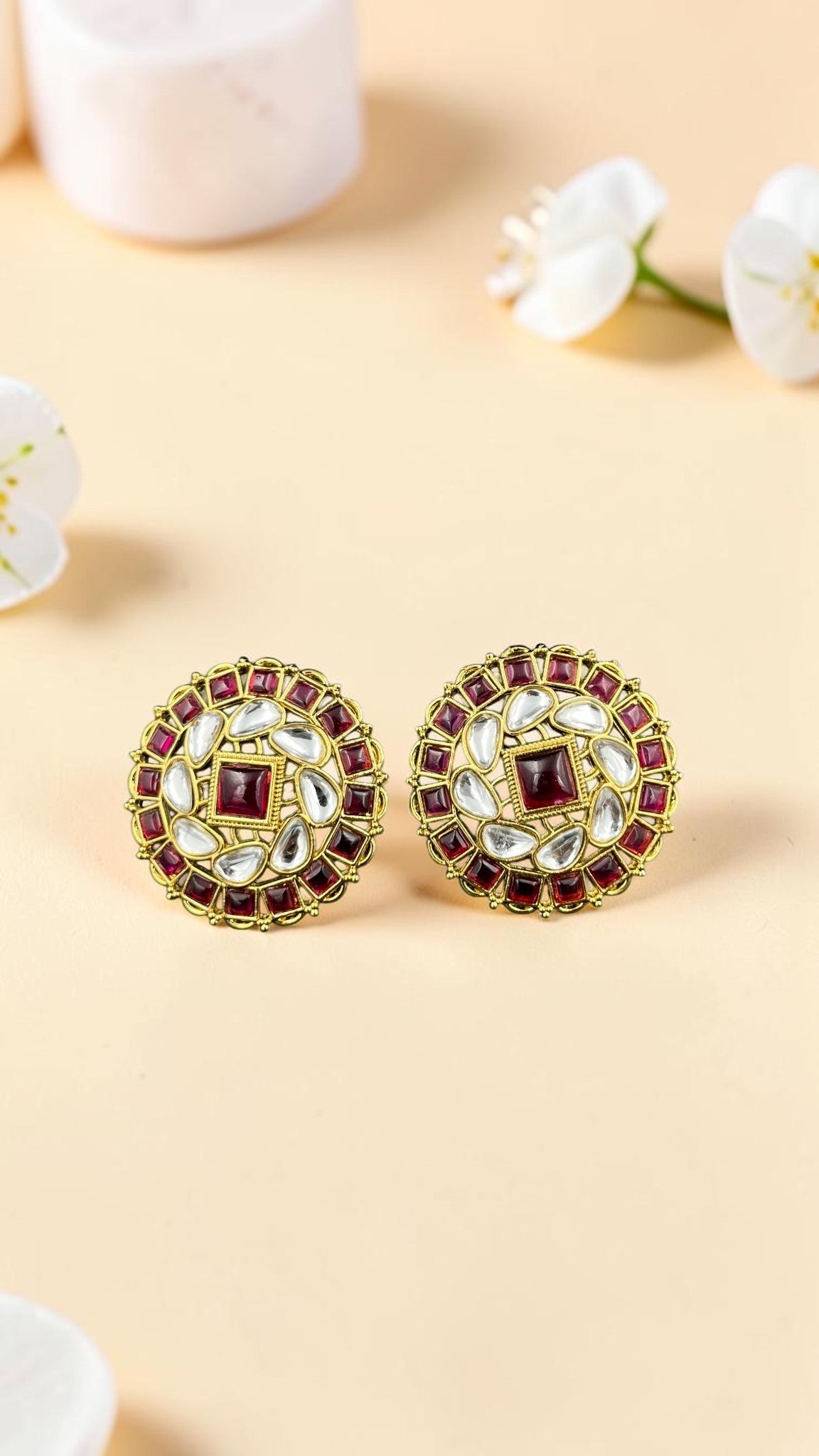 SHE BEAUTY premium kundan tops featuring round gold-tone settings with deep red stones and clear kundan accents