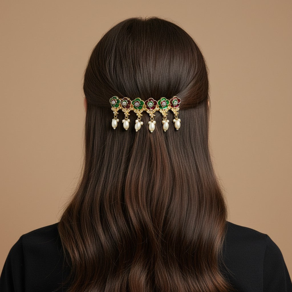 SHE BEAUTY AD rose meenakari barrette featuring red and green floral enamel work with dangling white pearl accents