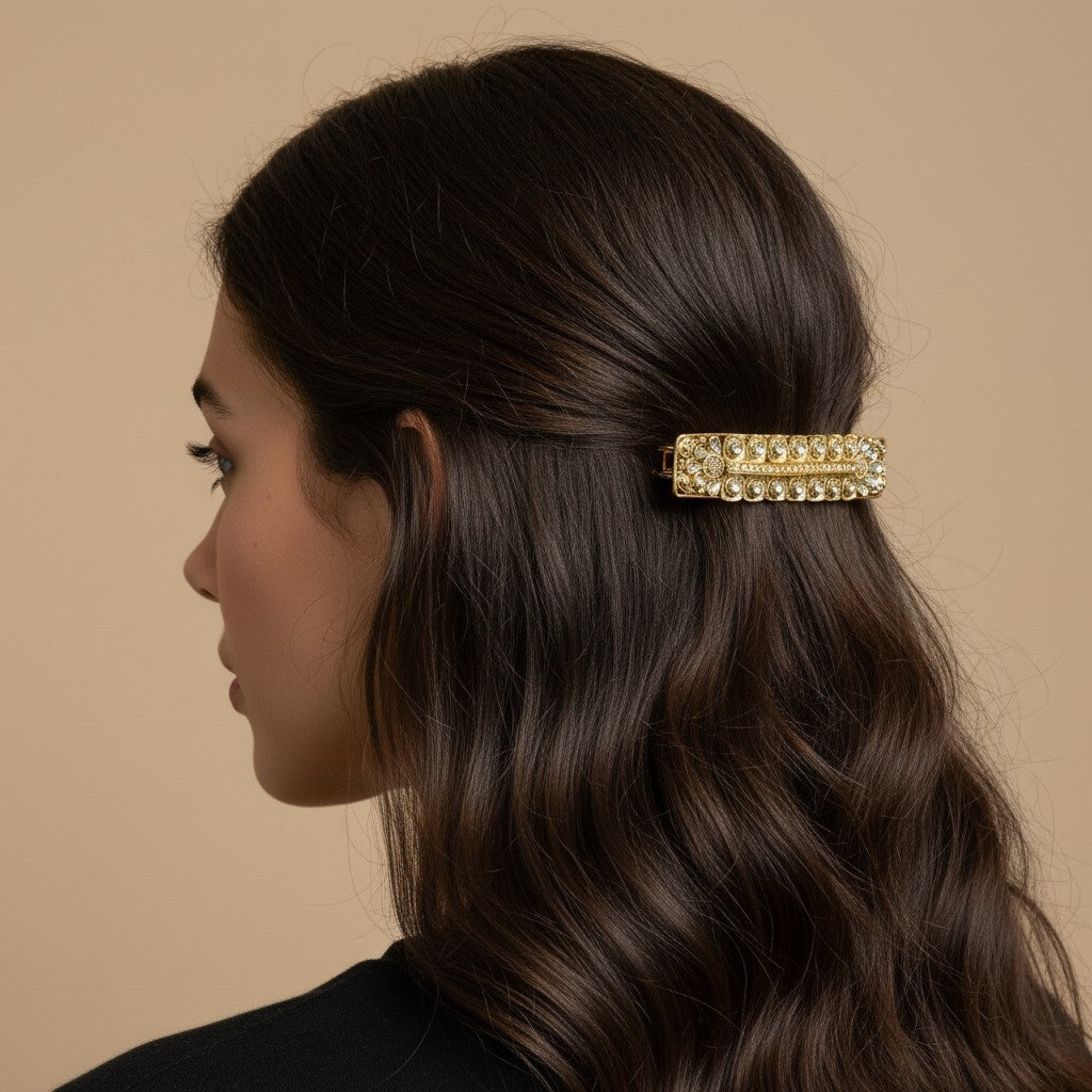 SHE BEAUTY boho vintage metallic barrette with crystal embellishments worn in long dark wavy hair