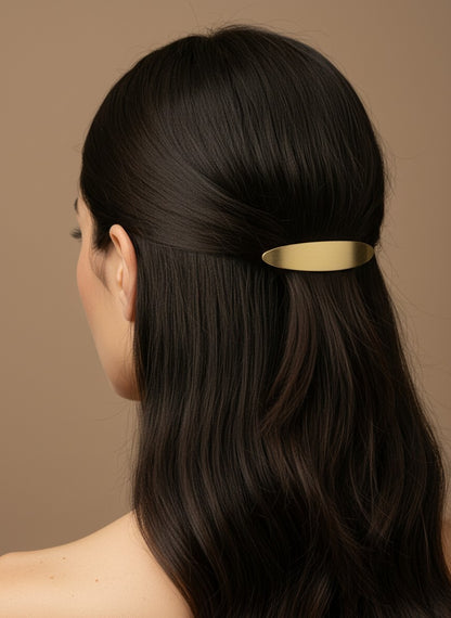 SHE BEAUTY solid metallic gold barrette worn in dark hair for a stylish and elegant festive look