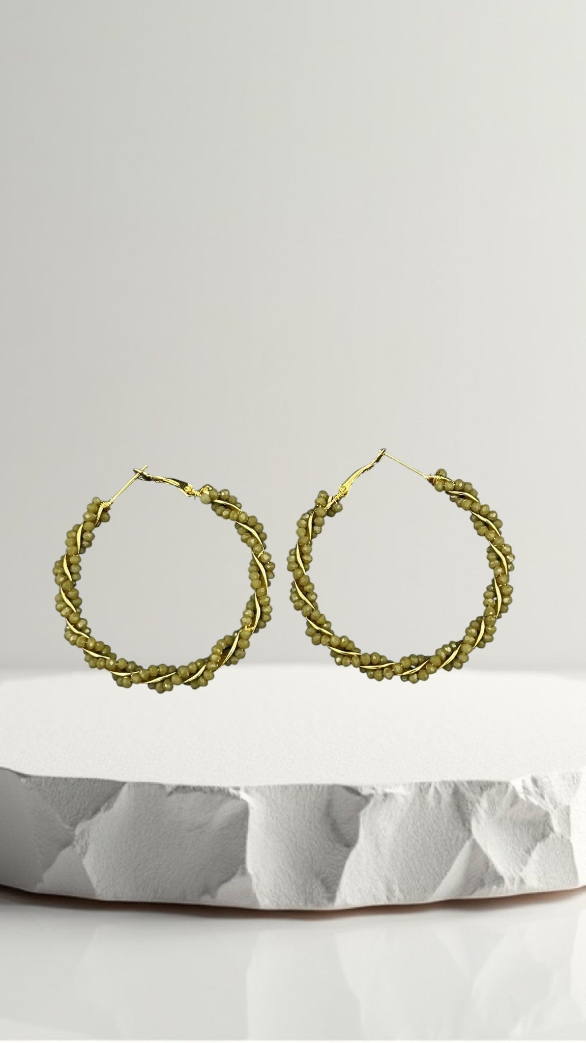 SHE BEAUTY Girlish Crystal Bali hoop earrings featuring olive green beaded wire wrapped around a gold-tone frame.