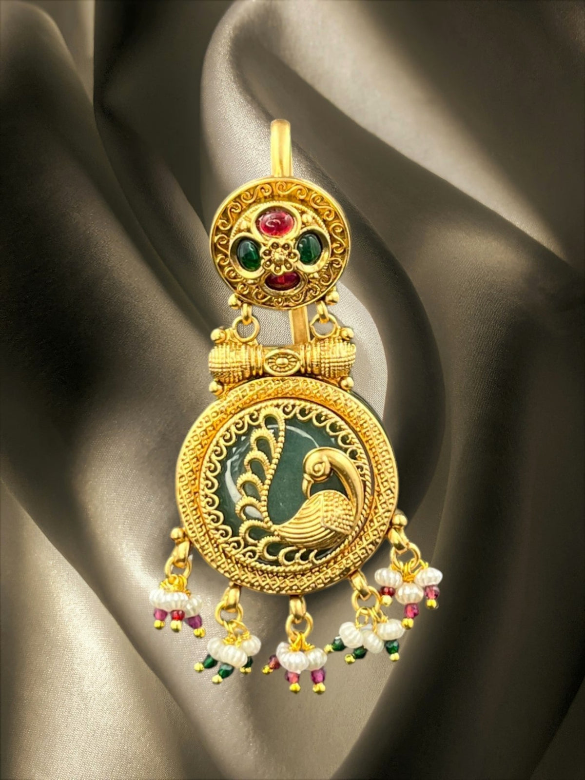 SHE BEAUTY gold-toned peacock juda hair brooch with ruby, emerald, and pearl accents for festive party wear.