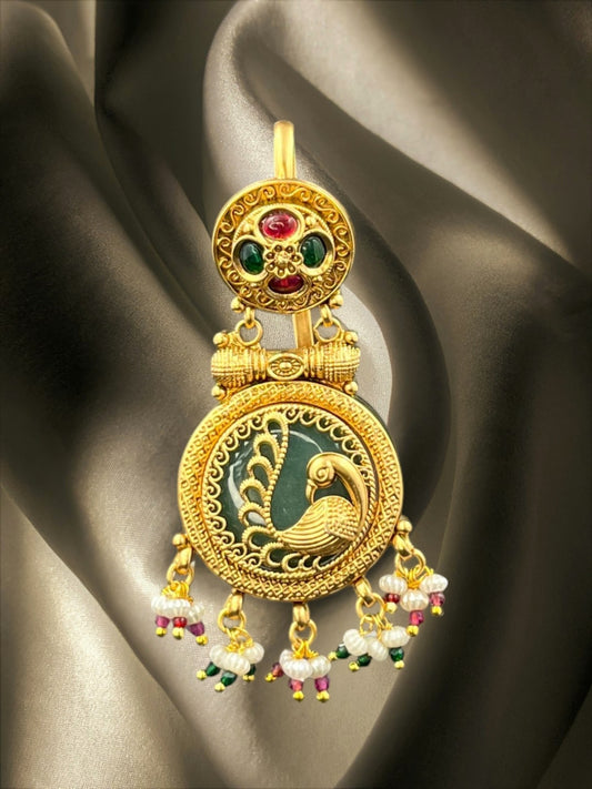 SHE BEAUTY gold-toned peacock juda hair brooch with ruby, emerald, and pearl accents for festive party wear.