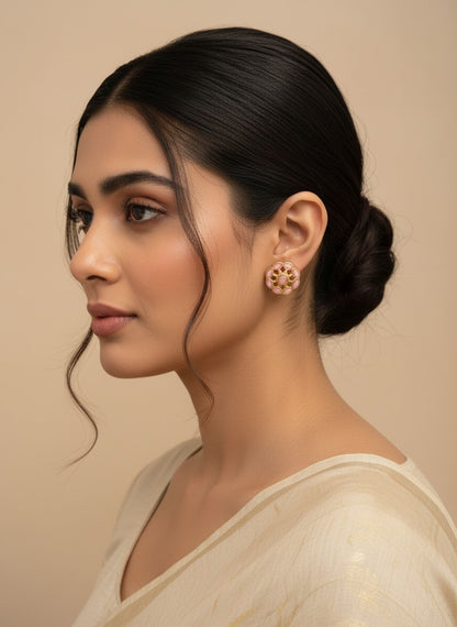 SHE BEAUTY COLOUR STUDS featuring round pink stone floral earrings worn by a woman in a neutral ethnic outfit