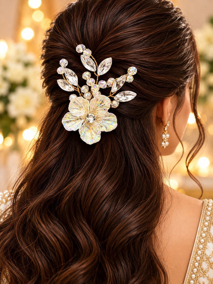 SHE BEAUTY AD Prism Blossom hair pin featuring iridescent flower petals and sparkling crystals in brunette hair