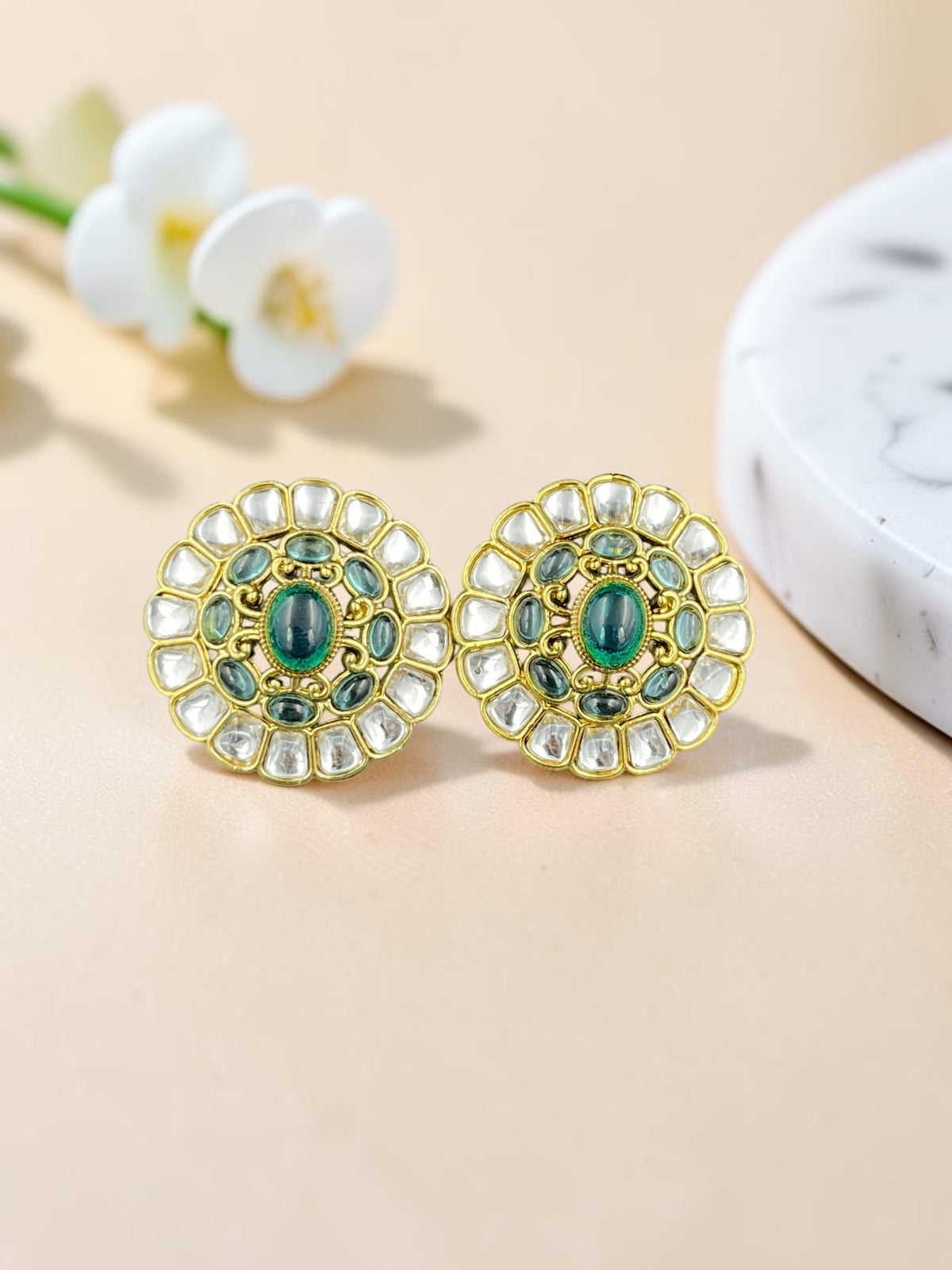 SHE BEAUTY round kundan tops with emerald green stones and gold-tone metal, perfect for traditional Indian outfits.