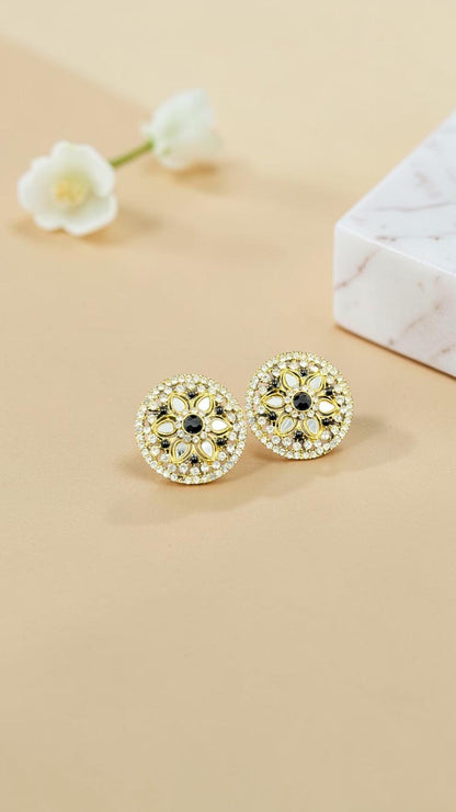 SHE BEAUTY round mirror stone tops featuring intricate floral patterns with white and black accents for festive wear.