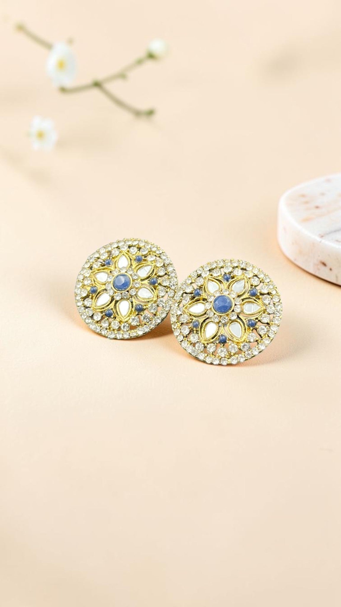 SHE BEAUTY round mirror stone tops with intricate gold-tone floral detailing and blue accents for ethnic wear.