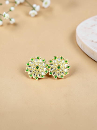 SHE BEAUTY Royal Kundan gold stud earrings with intricate floral design, white stones, and green accents.