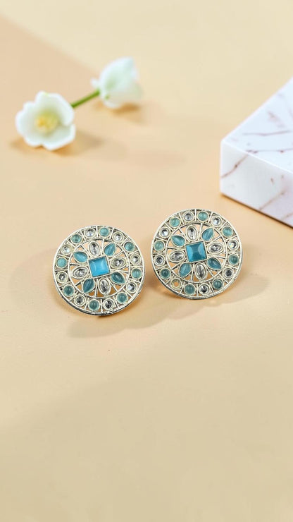 SHE BEAUTY silver circular stud earrings featuring intricate filigree patterns and light blue stone accents