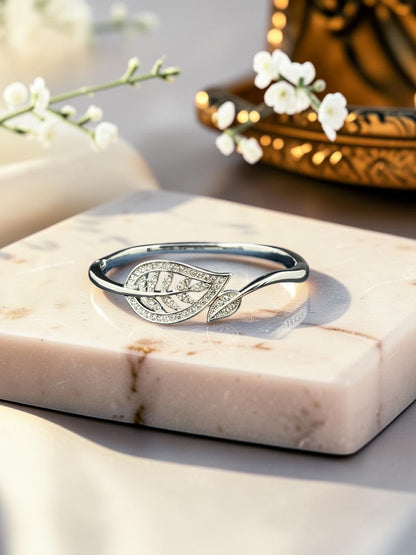 SHE BEAUTY anti-tarnish silver bracelet featuring a delicate leaf design encrusted with sparkling zirconia stones.