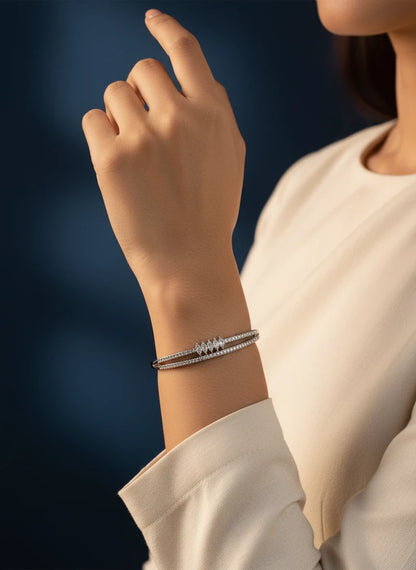 SHE BEAUTY anti-tarnish silver bracelet featuring sparkling zirconia stones on a delicate double-band design