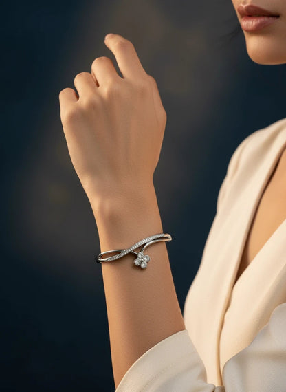 SHE BEAUTY anti-tarnish silver bracelet featuring a delicate flower design with sparkling zirconia stones on a wrist