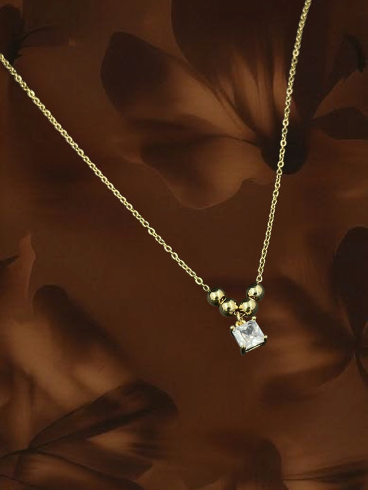 SHE BEAUTY Korean solitaire pendant necklace featuring a square cubic zirconia stone and gold-tone bead accents