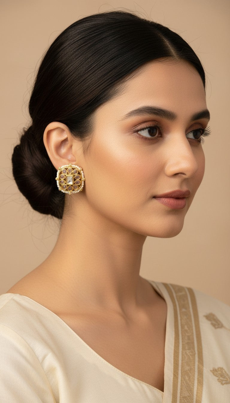 SHE BEAUTY square kundan tops featuring intricate gold-tone detailing and stone accents worn by a woman in a bun.