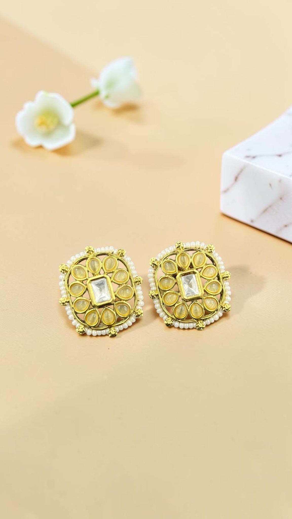 SHE BEAUTY square kundan tops featuring gold-tone metal, central clear stones, and delicate white pearl accents.