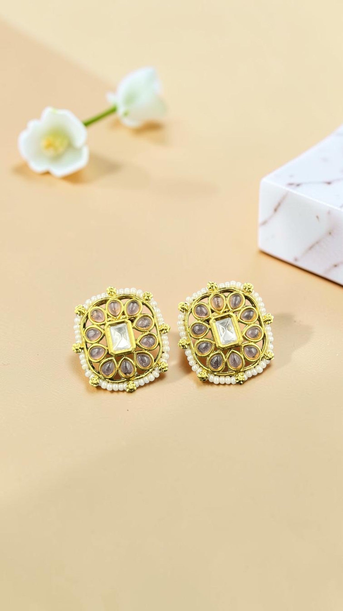 SHE BEAUTY square kundan tops with gold-tone metal, central stone, and delicate pearl border for festive wear.