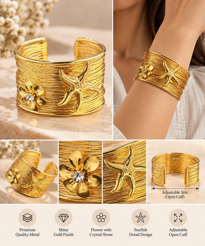 SHE BEAUTY golden multi-layer cuff bracelet featuring a starfish and flower charm with a central crystal stone
