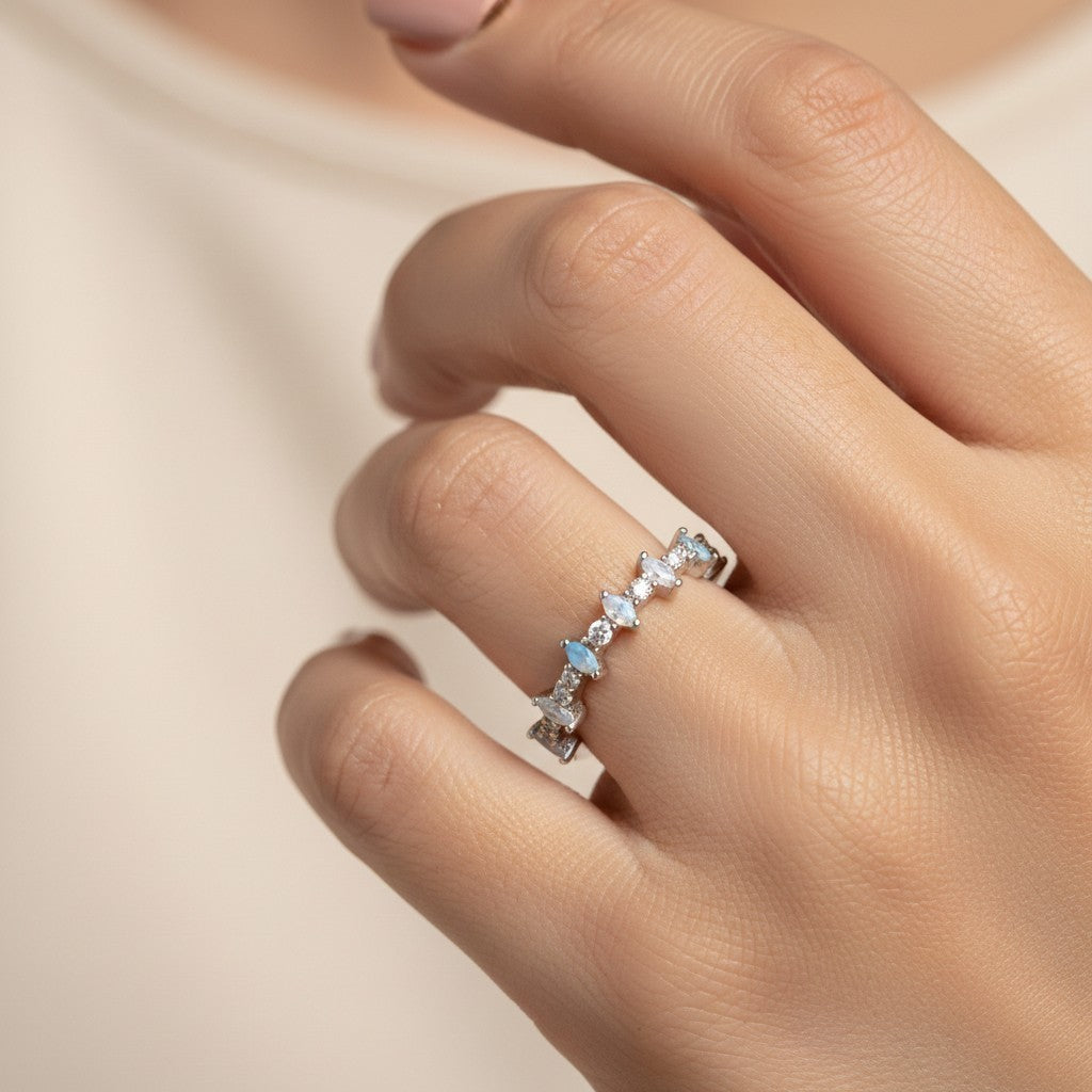 SHE BEAUTY sterling girlish ring featuring marquise-cut crystals and iridescent stones on a delicate silver band
