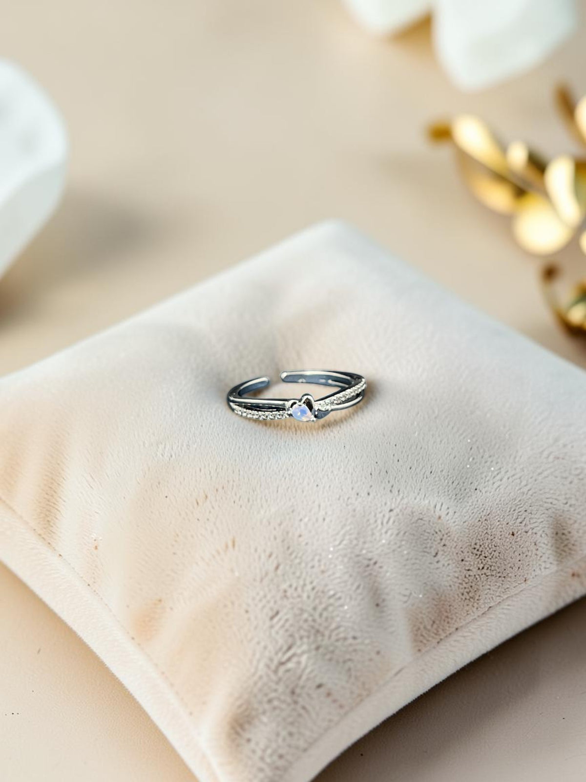 SHE BEAUTY sterling silver girlish ring with a delicate heart-shaped stone and sparkling pavé accents on a cushion