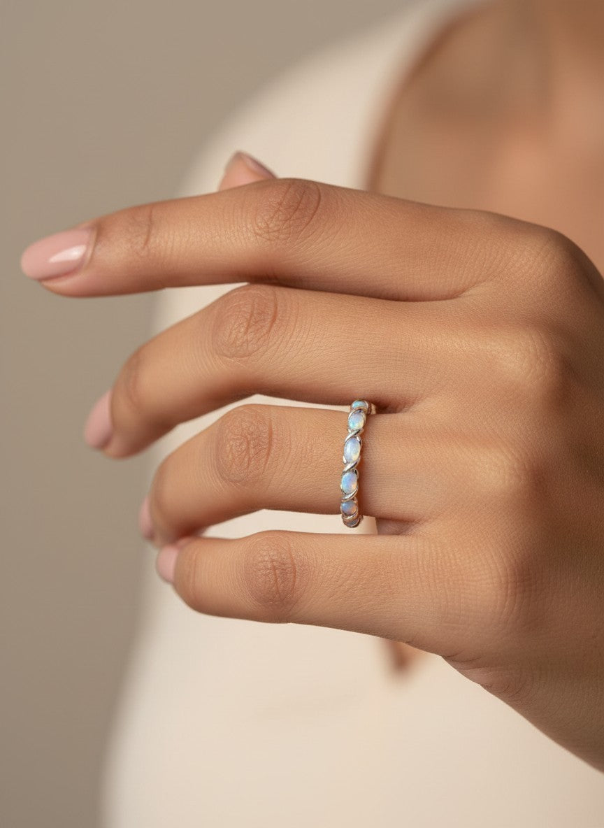 SHE BEAUTY sterling silver girlish ring featuring a delicate twisted band with iridescent opal-style stones