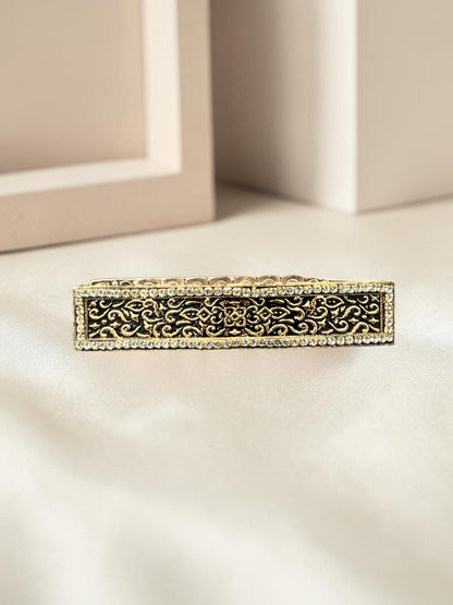 SHE BEAUTY vintage metallic barrette with intricate black lace-style filigree and sparkling crystal border