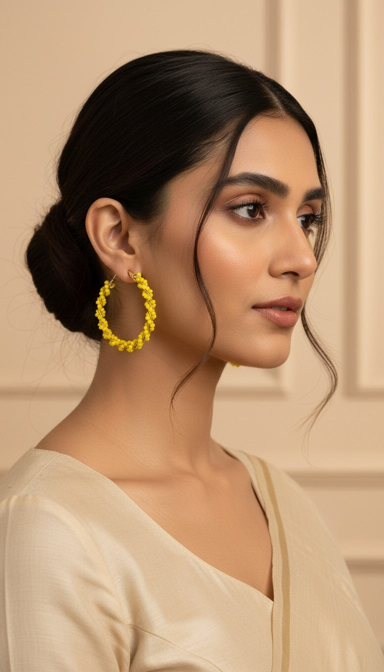 SHE BEAUTY Girlish Crystal Bali hoop earrings featuring vibrant yellow beaded texture worn by a woman